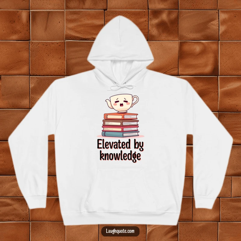 Funny teacup in a precarious wobble atop a pile of books, a cozy and humorous hoodie.